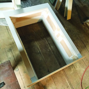 Then the casings were fastened to the side panels using 18-gauge pneumatic brad nails and trim screws.