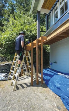 I started framing the stairs from the top and worked my way down, one box at a time. At this stage of the project, I was working solo, so I supported the cumbersome boxes on stepladders as I roughed in the stairs, screwing the first box to the deck framing, and subsequent boxes to each other.