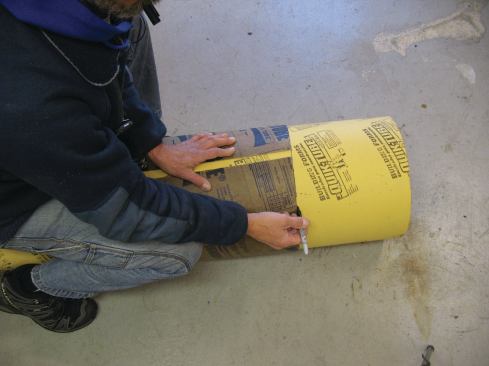 A foot-long section of a footing form cut cut from the factory end and slit lengthwise makes a good template. Use the factory end for scribing the cut line.