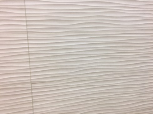 Texture in ceramic tile is coming to walls. Shown here is DalTile’s Materika