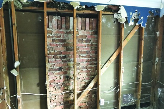 Outdated structural details were revealed such as gypsum sheathing and diagonal bracing.