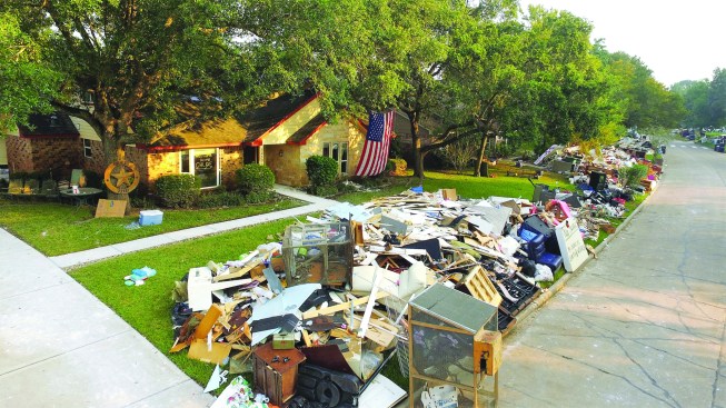 All the debris was dumped at the curb.