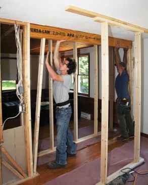 Removing part of an interior bearing wall to create an opening less than 12 feet long with a direct load path to the foundation is a straightforward condition that most competent builders can handle on their own. However, on the job shown here, an engineer provided by the LVL supplier verified the beam size and bearing requirements—welcome guidance for the builder.