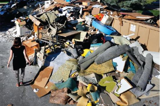 The sheer volume of debris quickly filled city-supplied roll-offs, prompting residents to dump debris on the ground nearby, blocking haulers’ access.