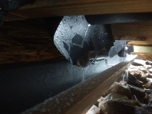 Water flowing off the membrane will be deflected by the scuppers into the gutter.
