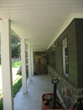 Though not required, a ceiling applied to the bottom of the joists gives the space a finished look.