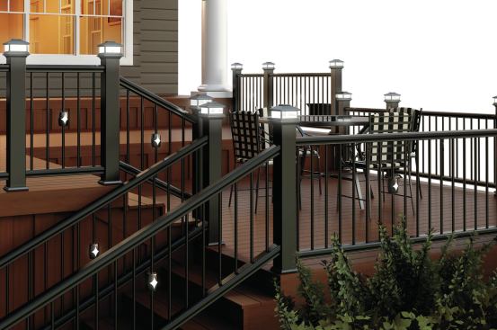 Low-voltage lighting incorporated in post caps and balusters requires a transformer located out of the weather. Hollow railing pieces—metal, vinyl, or composite—make it simple to snake the requisite wiring.