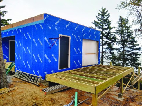 The deck joists are hung.