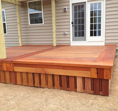 On this low deck, Casey framed the Brazilian teak decking with a Brazilian tigerwood inlay, fascia, and border.