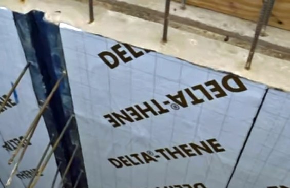 It is overlapped by Delta-Thene, a 40-mil-thick peel-and-stick wall membrane that’s about 3 feet wide.