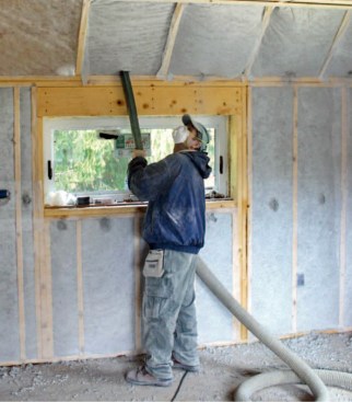 Cavity insulation limits conductive heat flow in the majority of the wall. The framing, however, will conduct heat at a greater rate than the insulation, creating, in effect, a "thermal bridge." (photo: Jonathan Tauer)