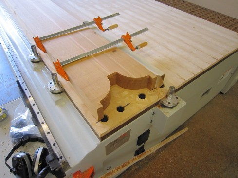 A CNC machine was used to cut out the parts, a pair at a time.