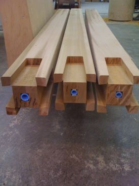 The completed columns, with mortises cut, are ready for installation.