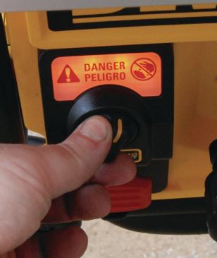 The DWE7499GD adds a Guard Detect on/off paddle switch that warns you with a flashing light when the blade guard isn’t properly installed. To work without the guard, you must turn the bypass knob each time you turn on the saw.