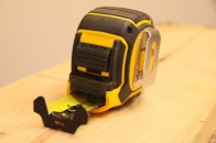 A large wing-style hook is ideally suited for framing tasks, though not for short inside measurements. The tape itself features easy-to-read markings oriented for right-handers. The belt clip is unique in that it doesn't attach with a screw and is always open, making it easy to clip onto pants, belts, and tool bags.
