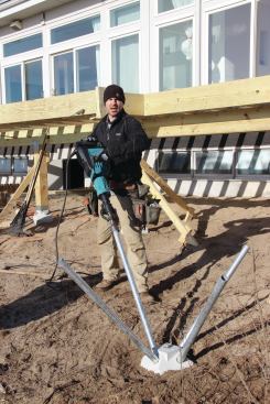 With a demolition hammer and special pin driving bit, 

it takes less than 10 minutes to fully drive all the pins for a pier.
