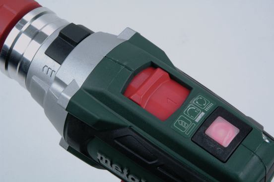 To switch the Metabo from driver mode to drill mode quickly, pushing the lighted button on top the tool bypasses the clutch setting. The clutch action resumes once you push the button again or adjust the clutch setting dial.