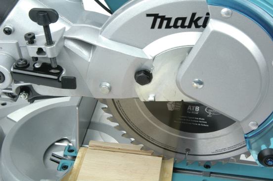 The depth of cut can be tweaked on all of the saws, except on the DeWalt, using setscrews as seen in the upper left. The screw to the left is used to fine-tune the full blade depth, while the one to the right is used for elevated depth settings for creating rudimentary dadoes and rabbets.