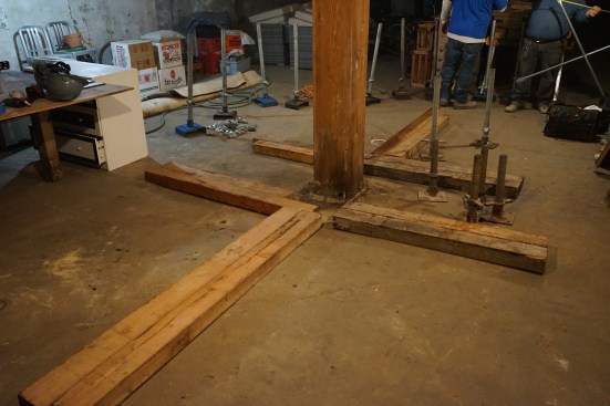 As the crew begins to set up temporary support, they begin with a single layer of 4x6 cribbing to support shoring frames.