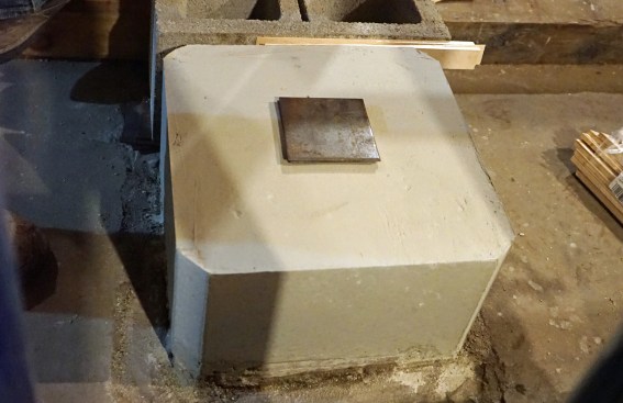 The post will sit on a 4x4 steel shim that sits in the middle of the new pier.