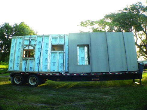 Superior Walls concrete panels arrive on site with door and window openings precut according to the plans the builder supplies. 