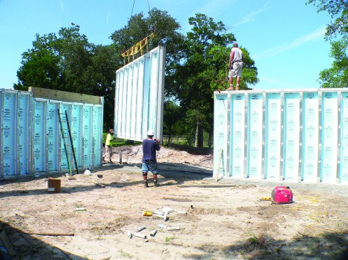 Setting the walls for one story takes about half a day.