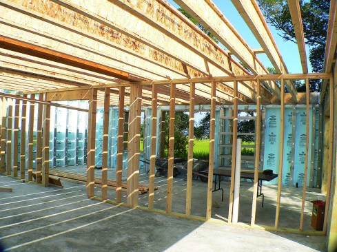 Superior Walls panels have a 3 1/2-inch-deep “rim ledge” at the inside top of the wall, completely within the wall’s exterior skin, wherever the floor system needs to bear at the exterior wall. 