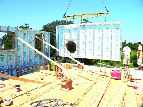 Upper-story walls require less preparation, since there isn’t any groundwork involved.