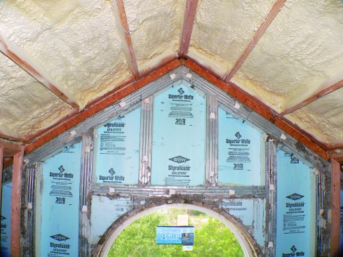 The closed-cell insulation helps glue the roof deck to the structure and make the roof-to-wall joint airtight.