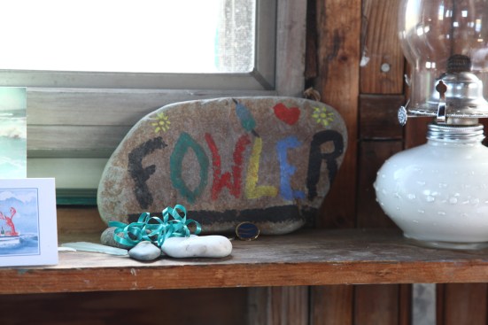 A hand-painted sign welcomes folks lucky enough to stay in the Fowler Dune Shack for a week.