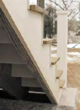 Figure 2. Avoid miter joints on porch and deck stair trim. Instead, run stair risers long and butt the skirt board into the risers.