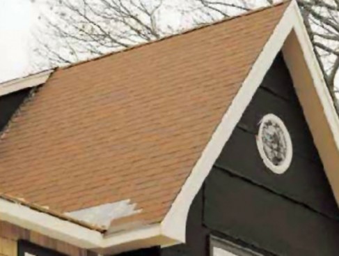 Figure 3. The deep eaves on this remodel give extra protection to walls and windows beneath.