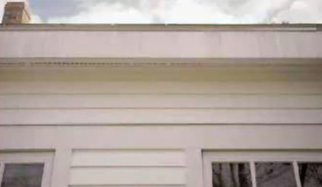 Figure 4. If drip edge is installed too close to the fascia, rain runoff will drain over the boards and lead to discoloration. The author recommends spacing drip edge slightly off of exterior trim to direct water outwards.