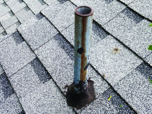 “Black jacked” plumbing vents are all too common, but this is not a good way to flash a roof penetration.