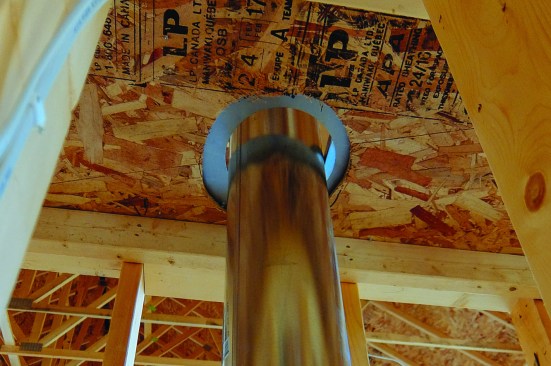 Vents for combustion appliances must not touch combustible materials.
