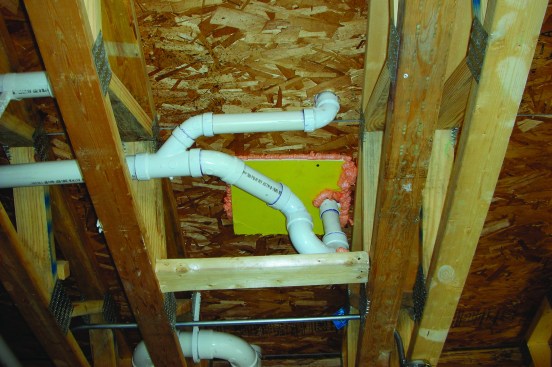 Tub area. Plumbers often cut out a section of the subfloor to install traps, leaving a massive hole under the tub. Rigid foam (or another easy to cut and handle panle stock), and foam sealant at the edges, can remedy this.