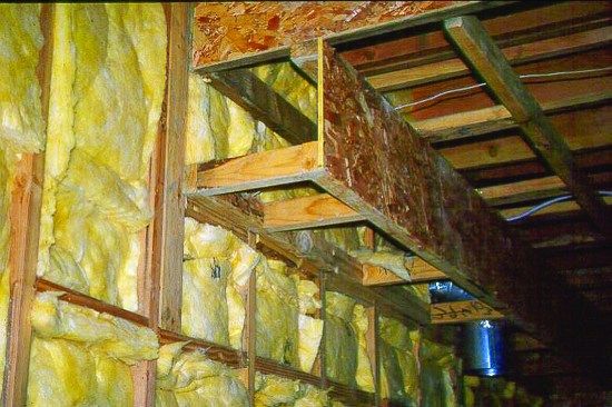 Cabinet soffits are huge leaks to the attic.