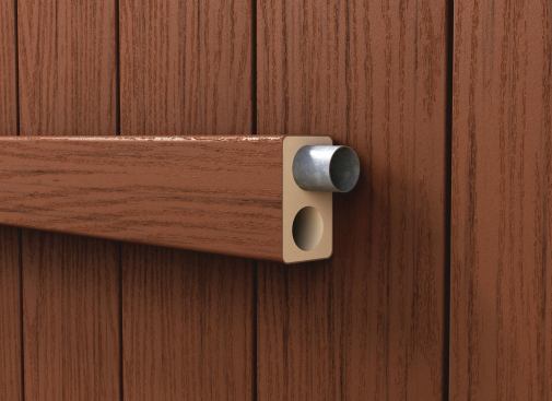 Enduris’ Endwood capped PVC fence rails have a pair of 1-inch-diameter voids that can be reinforced with steel tubing. 
