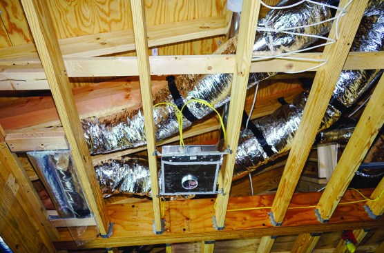 Ductwork installed in this high-end custom home under construction will be difficult to access after the ceilings are
drywalled.