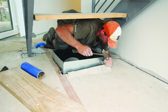 A makeup-air duct dumps into the living space.