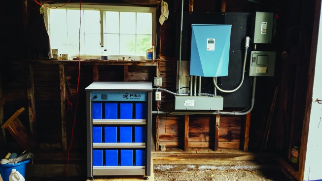 The solar array combined with a Pika Energy battery and controller inside the barn, kept Hans Albeeās house powered up during a recent statewide power failure in Maine.