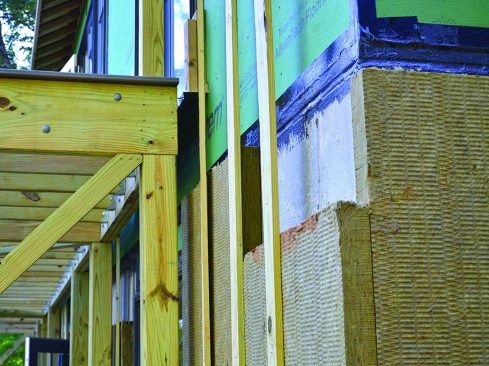 Continuous exterior insulation boosts the wall R-value.