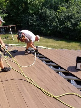 Azek PVC decking was installed on the diagonal and fastened to the sleepers with TigerClaw clips.