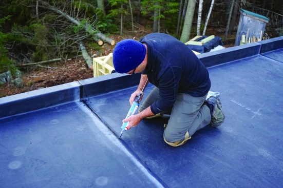 Once all the EPDM was down, the author sealed every seam with lap caulk.