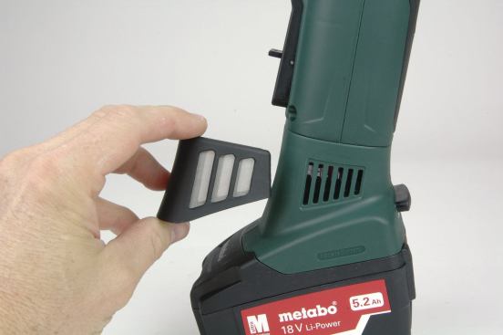 Removable filter screens on the Metabo (shown) and the Milwaukee models keep abrasive particles from getting sucked into the motor windings. The screen can be removed for maximum air flow or cleaning. The Milwaukee comes with a spare replacement screen.