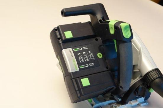 The saw can run on one battery, but two 18-volt batteries deliver 36 volts for optimal performance. The saw has two separate battery gauges on board.