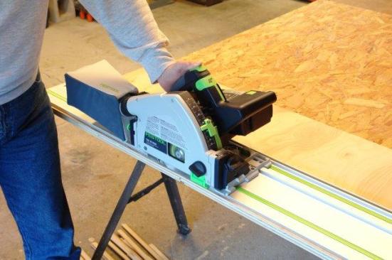 The author tested the saw’s power, runtime, and dust collection by making repetitive cuts in sheet goods and solid lumber. The photo shows a metric depth scale, but the saw is now sold with an imperial scale instead.