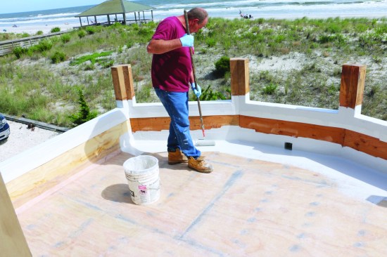 A paint roller was used to cover larger areas.