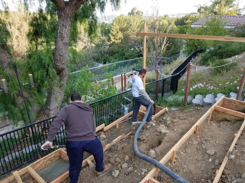 Nine 2-foot-square-by-30-inch-deep footing forms were filled with 4,500-psi concrete.