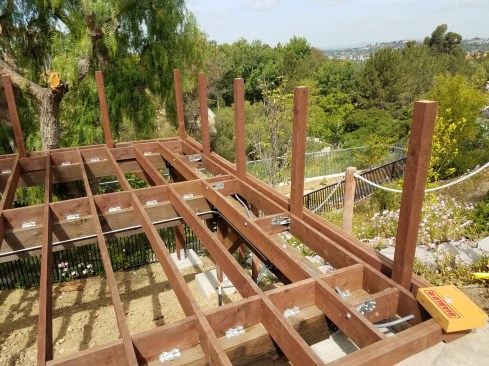 Then they were fastened to the beams to help limit lateral movement and to provide some uplift value.